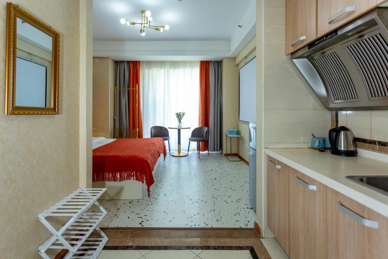 Dalian Hong XI Yuan Apartment Wanda Plaza Exterior photo