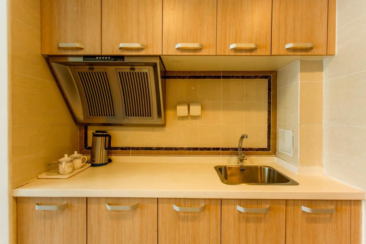 Dalian Hong XI Yuan Apartment Wanda Plaza Exterior photo